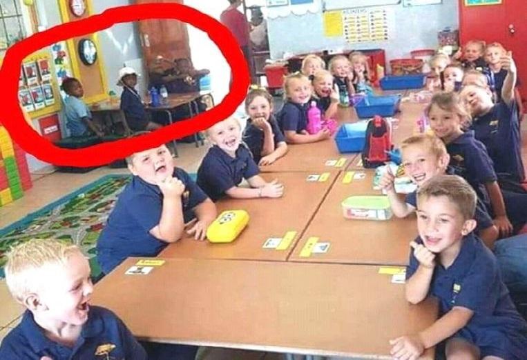 Teacher suspended for 'segregation' of black pupils in South African school