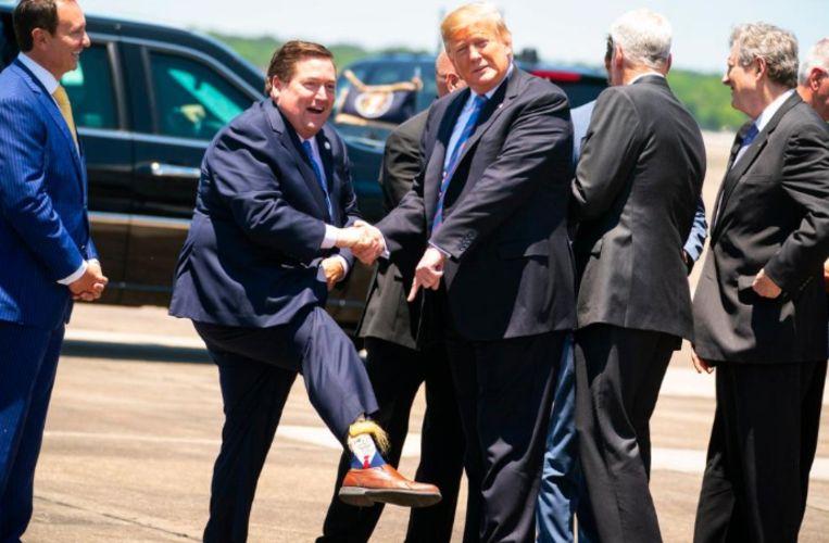 Billy Nungesser greets US President with bizarre (hairy) Trump socks - Afrinik