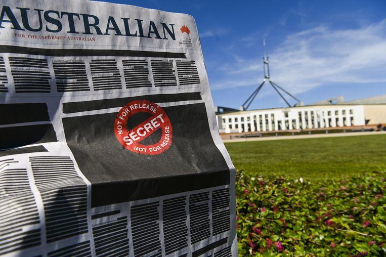 Front pages of Australian newspapers are blacked out in protest
